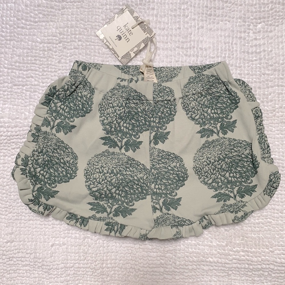 kate quinn ruffle track shorts